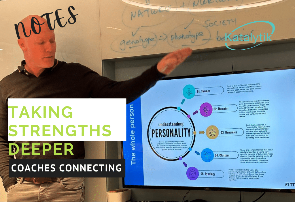 A man standing in front of a screen pointing to a diagram and the words taking strengths deeper